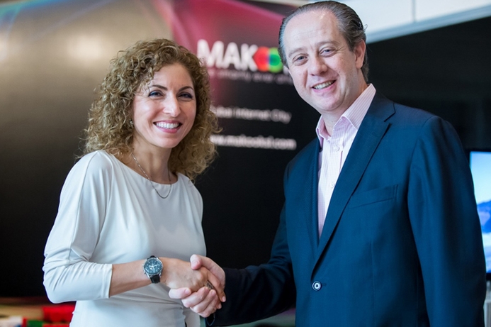 Prodea Systems’ Anousheh Ansari (left), shakes hands with Nasri Tehini, CEO of Makook after signing the deal. Makook Smart Living partners with Prodea Systems