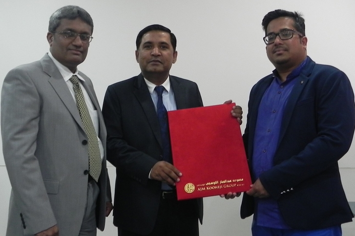 Ali Mohd Akbar Khan, assistant GM, AJM Kooheji Group,(centre) says Ctroniq will be widely distributed to all leading CE retailers in Bahrain. AJM Kooheji Group, Ctroniq partner