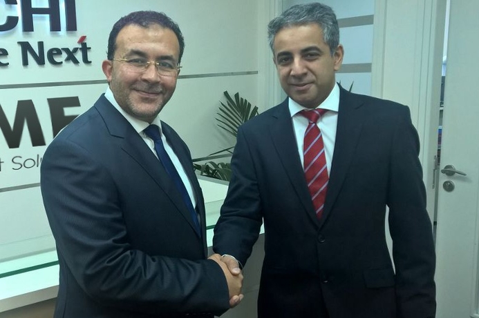 STME CEO Ayman Al Bayaa (left), shakes hands with Ravi Ahluwalia of Hitachi Europe Ltd after signing the deal. STME, Hitachi partner for digital signing solutions