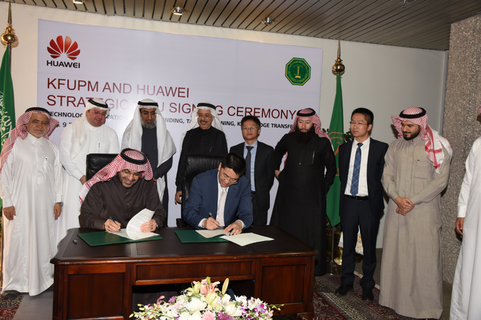 H.E. Dr. Khaled S. Al-Sultan (seated left), Rector of King Fahd University of Petroleum & Minerals and Mr. Ramadan Ding (seated right), CEO of Huawei Saudi Arabia signs the strategic MOU, while the KFUPM and Huawei officials look on. KFUPM and Huawei sign MoU for O&G ICT