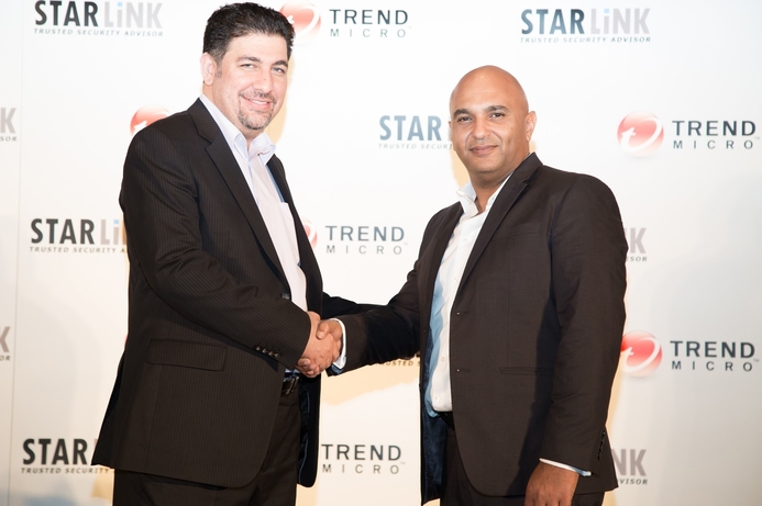 StarLink's Nidal Othman (left) shakes hands with Trend Micro's Ihab Moawad after signing the deal. Trend Micro appoints StarLink for MENA