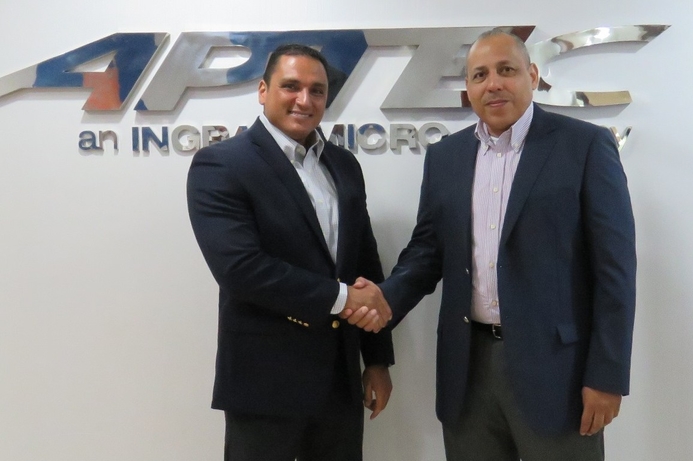 Samsung's Sherif Fahim (left), shakes hands with Aptec MD Bahaa Salah, after signing the deal. Samsung signs Aptec as official distributor for Gulf