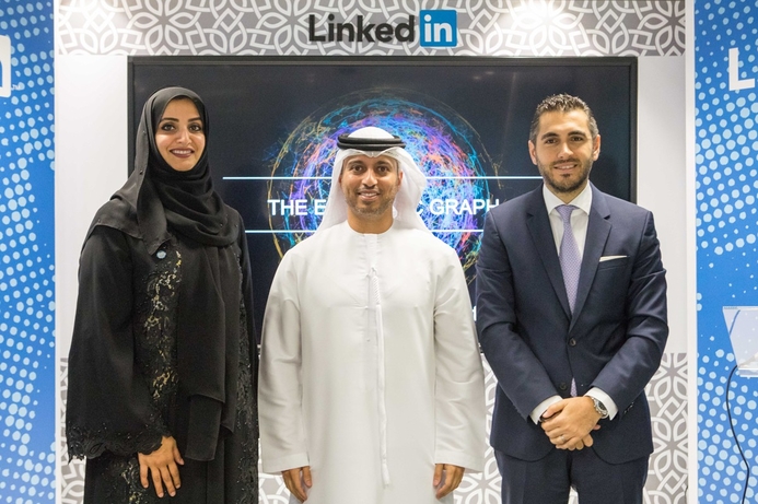 HE Dr. Aisha Bin Bishr, HE Dr Ahmad Belhoul, and Ali Matar, Head of LinkedIn Talent Solutions LinkedIn data records UAE economic growth