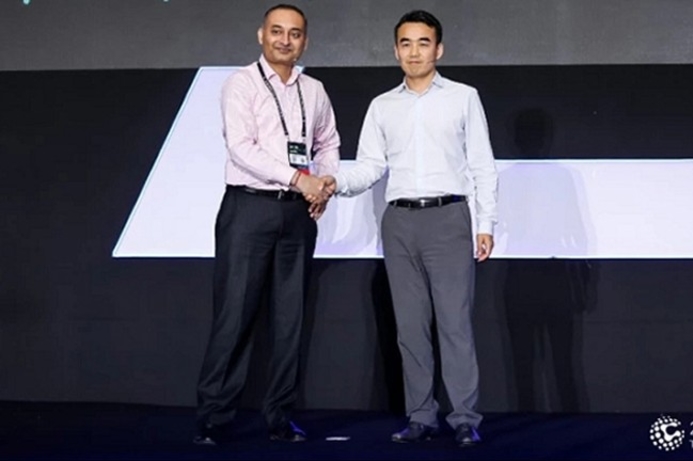 Executives from Tata Communications and Alibaba Cloud shake hands after announcing the deal at the Alibaba Cloud Cloud Computing Conference held in Shanghai recently. Tata Communications and Alibaba Cloud partner