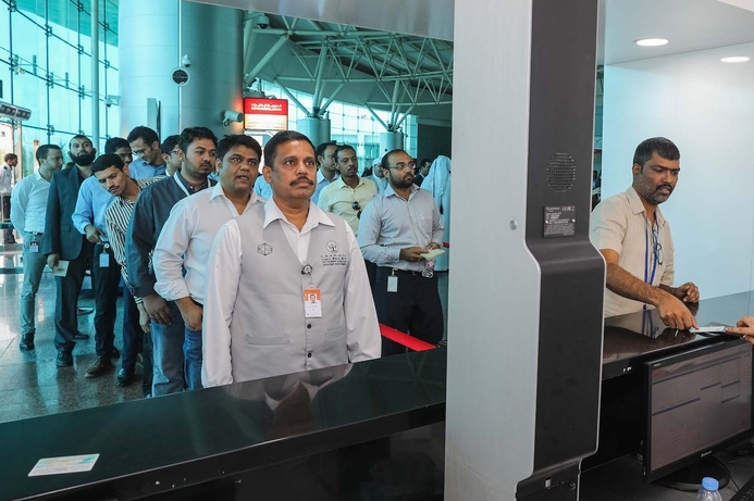 DeG staff members during their registration at the Sharjah International Airport’s Smart Gate. SAA’s smart gate program registers its first government body