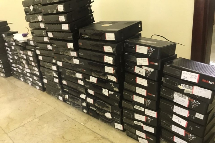Detectives found dozens of illegal Dish TV India satellite set-top-boxes. Kuwait police arrest gang over OSN TV piracy