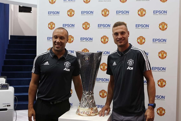 Manchester United legends Mikaël Silvestre (L) and Nemanja Vidić. Manchester United legends visit Epson stand at GITEX