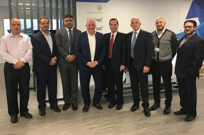 Executives from Epson and Forefront Technologies pose for a photo after signing the distribution deal. Epson appoints Forefront Technologies