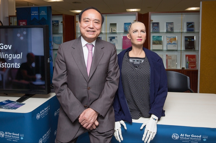 Houlin Zhao with Sophia, the first robot citizen, at the AI for Good Global Summit 2018. AI for Good Global Summit generates development projects