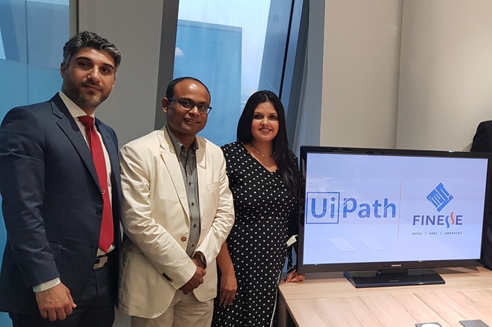 Finesse's Paul (centre) says the alliance will enable both companies to introduce high-performance digitisation and automation in business processes. Finesse, UiPath tie-up to offer robotic process automation services