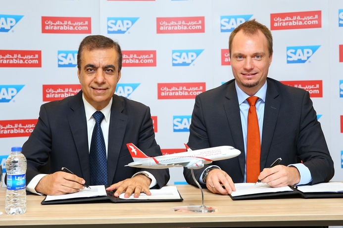Adel Al Ali Group CEO Air Arabia and Julien Bertin Managing Director SAP during the signing ceremony. Air Arabia selects SAP's SuccessFactors