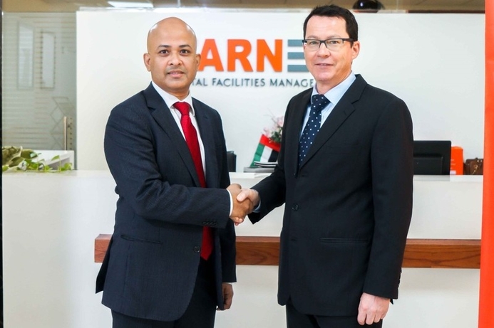 Ring's Meraj Hoda (left) shakes hands with Lukas Eigenmann, COO at H&G after signing the deal. Ring, Hitches & Glitches collaborate on smart home security solutions