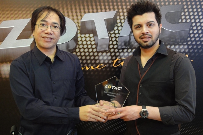 Iman Mozaffari (r), senior product manager, Golden Systems receives the award. Golden Systems scoops ZOTAC Award