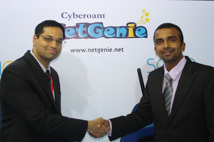 Rohit Mathur of FDC (l) with Pradeesh VS, Cyberoam NetGenie after signing the distribution agreement. Cyberoam, FDC partner for Middle East distribution