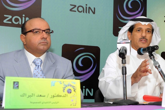 Zain chief executive Saad al-Barrak (left) and chairman Asad al-Banwan. Consortium to buy Zain stake for $14 billion