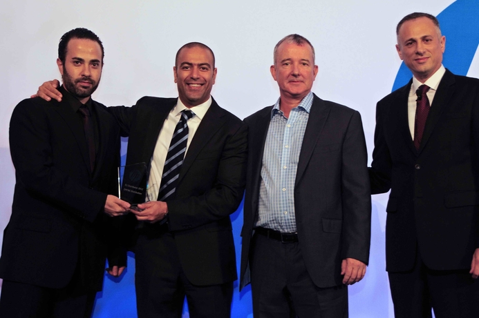 Emitac's Tannous (l) receives the award on behalf of the company. Emitac Distribution wins HP award