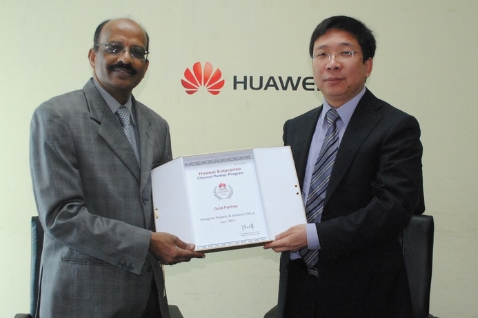 Qiang, GM, Huawei Qatar (l) shares a moment with Peregrine's Odassery after the signing ceremony. Peregrine deal boosts Huawei’s Qatar footprint