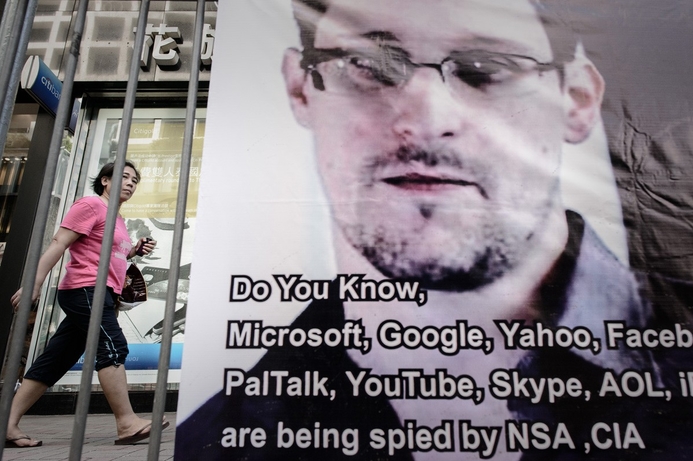 Snowden fled Hawaii last summer with thousands of documents on secret surveillance programmes. Develop secure comms software, Snowden tells hackers