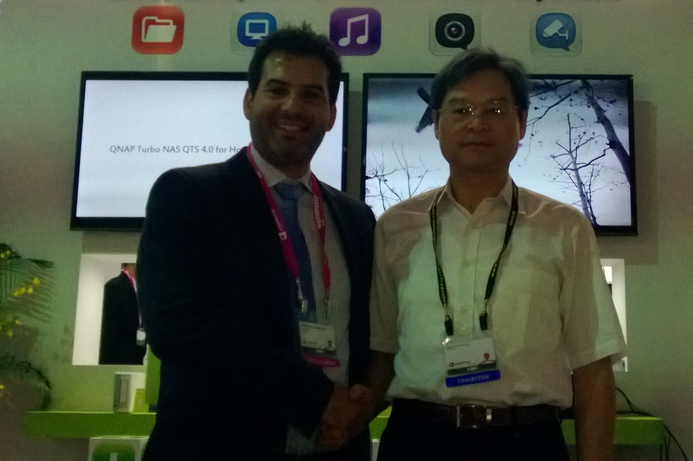Logicom's GM Demetris Demetriou (left) with Richard Lee, QNAP's chairman shake hands after signing the deal. Logicom and QNAP sign distribution deal
