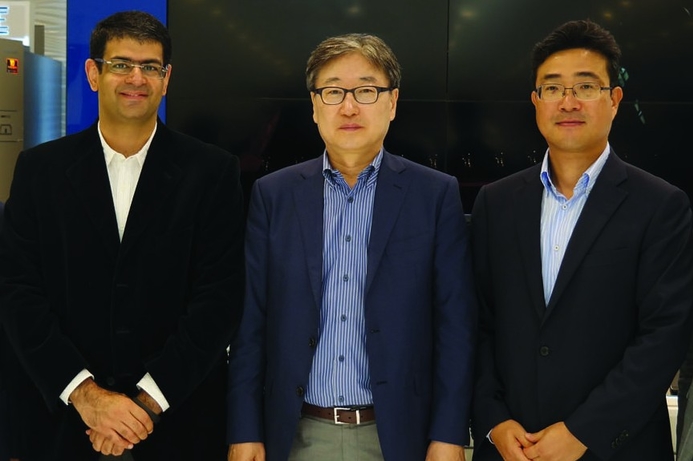 Jacky's COO Ashish Panjabi,(left) with a Samsung executives at the opening of the new brand store in Deira City Centre. Samsung’s brand store footprint grows