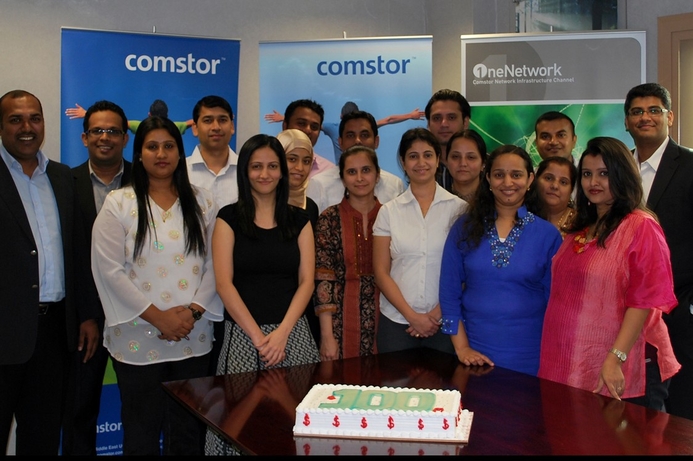 Comstor staff celebrate the double milestone. Comstor celebrates third ME anniversary