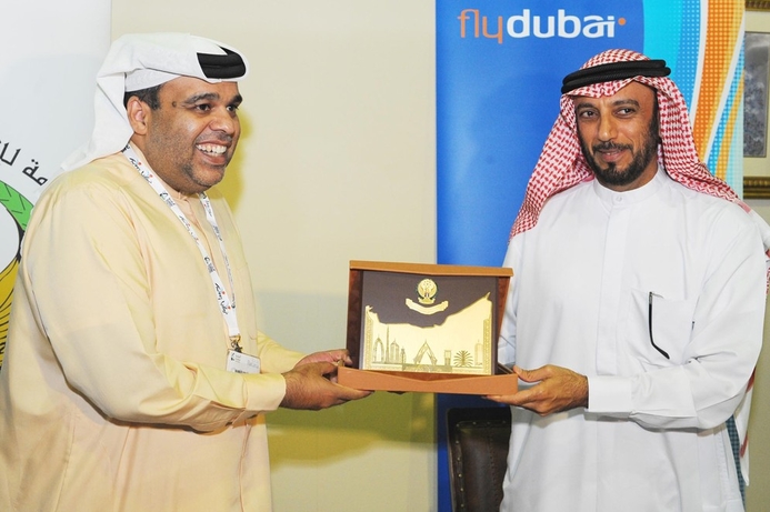 Major General Mohammed Ahmed Al Marri, (R) Director of DNRD and flydubai’s CCO, Hamad Obaidalla, announce a new visa service, which will be a trial with flydubai for three months from May 19th. DNRD and flydubai trial mobile visa service