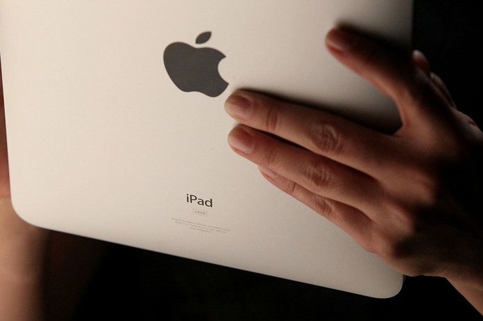 Devices like the Apple iPad are changing the make up of IT departments iPad driving adoption of consumer tech in enterprises