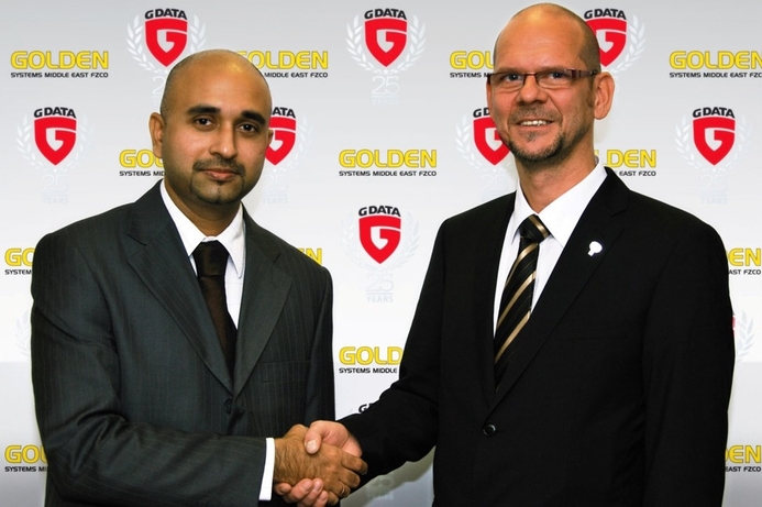 Sudhakar Suryanarayan, Software and Solutions Director of Golden Systems shaking hands with Dr Dirk Hochstrate, Managing Director of G Data Software AG following their distribution agreement. G Data Software heads to the Middle East