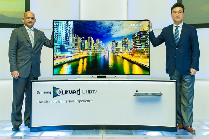 Young Soo Kim, right, president, Samsung Gulf Electronics and Vinod Nair, general manager, TVs, Samsung Gulf Electronics. Samsung announces regional launch of curved UHD TVs