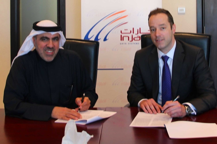 Ibrahim Lari, CEO at Injazat (left) and IHS' Matt Johnson at the signing ceremony. IHS, Injazat Data Systems sign agreement