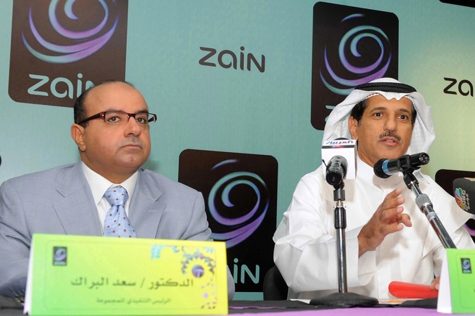 Zain chief executive Saad al-Barrak (L) and chairman Asad al-Banwan, address the media in Kuwait City on 31st August 2009. Zain shareholders vote to lift ownership cap