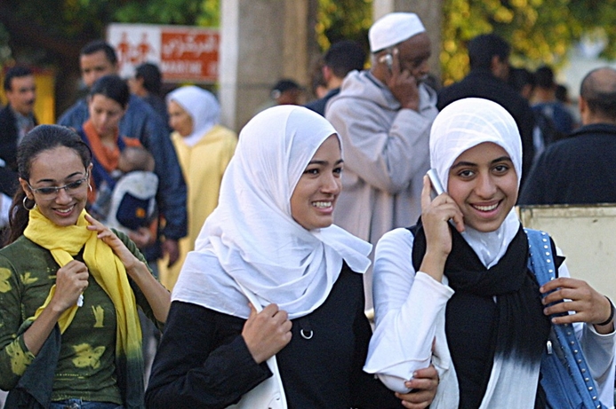 Moroccans using their mobile phones in the country’s capital, Rabat. Meditel sold to group of Moroccan investors