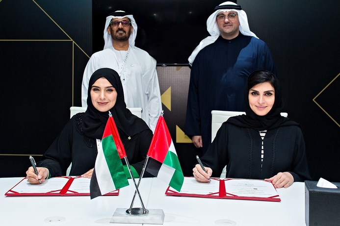 HE Dr Amna Al Dahak Al Shamsi and Dr Lamya Nawaf Fawwaz signing the MoU in the presence of HE Hussain Ebrahim Al Hammadi, Minister of Education (left) and Mohammad Jameel Al Ramahi, CEO of Masdar. Masdar and Ministry of Education collaborate on innovation