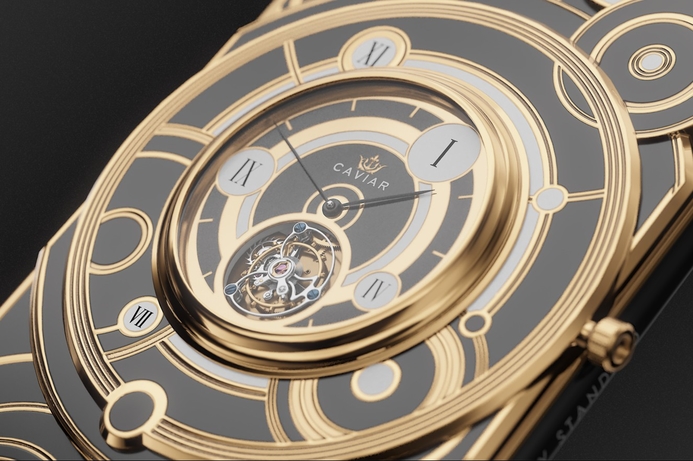 The Caviar Grand Complications Tourbillon includes a fine watch mechanism complete with tourbillon - a mechanical device to negate the effects of gravity on the watch components. Caviar merges iPhone XS and high-end mechanical watch