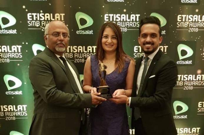 Anil Nair CEO of IRIS Health Services, COO Dr. Ann Jacob, and Sujith Menon Vice President Client Services. IRIS wins Innovation of the Year at Etisalat SMB awards