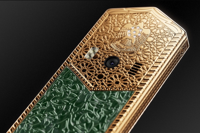 The phone includes the UAE national emblem, a falcon, with inset precious stones. Gold phone created in tribute to Sheikh Zayed