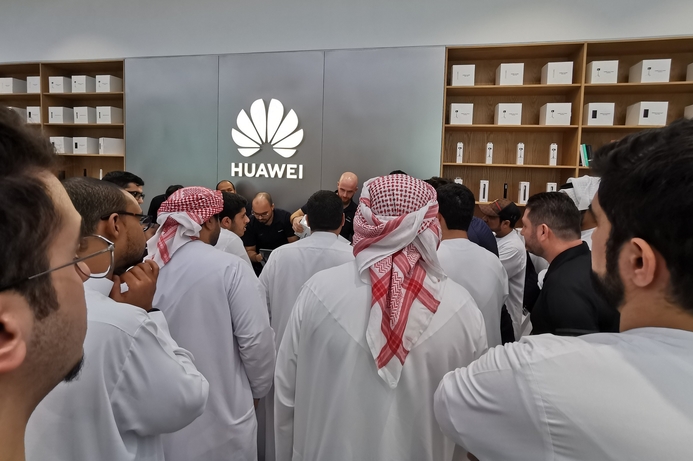 Consumers joining the line to pick-up their pre-ordered Huawei P30 phones, Huawei Experience Store in Mirdif City Center Huawei P30 preorders exceed expectations