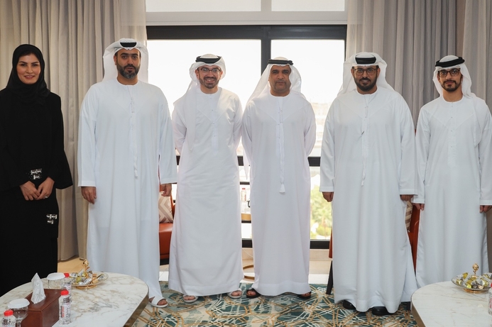 Ahmed Al Qassim and Jamal Hamed Al Marri with other Emirates NBD and DoF officials Emirates NBD implements digitised payment solution for Dubai Department of Finance